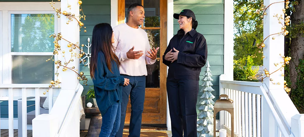 Terminix Technician speaking with customers